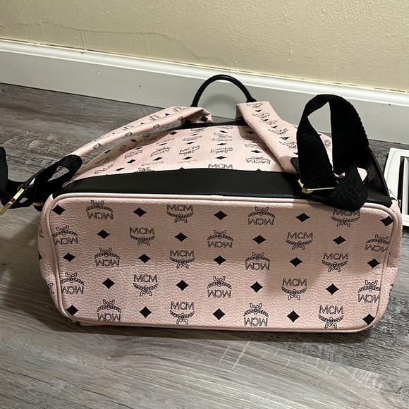 MCM large backpacks with detachable front pockets and use as crossbody bags.. - Picture 10 of 12